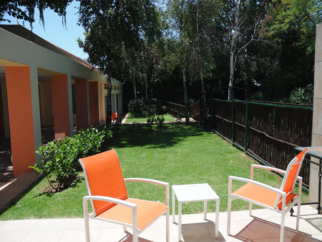 A private outdoor space beside the guest suites